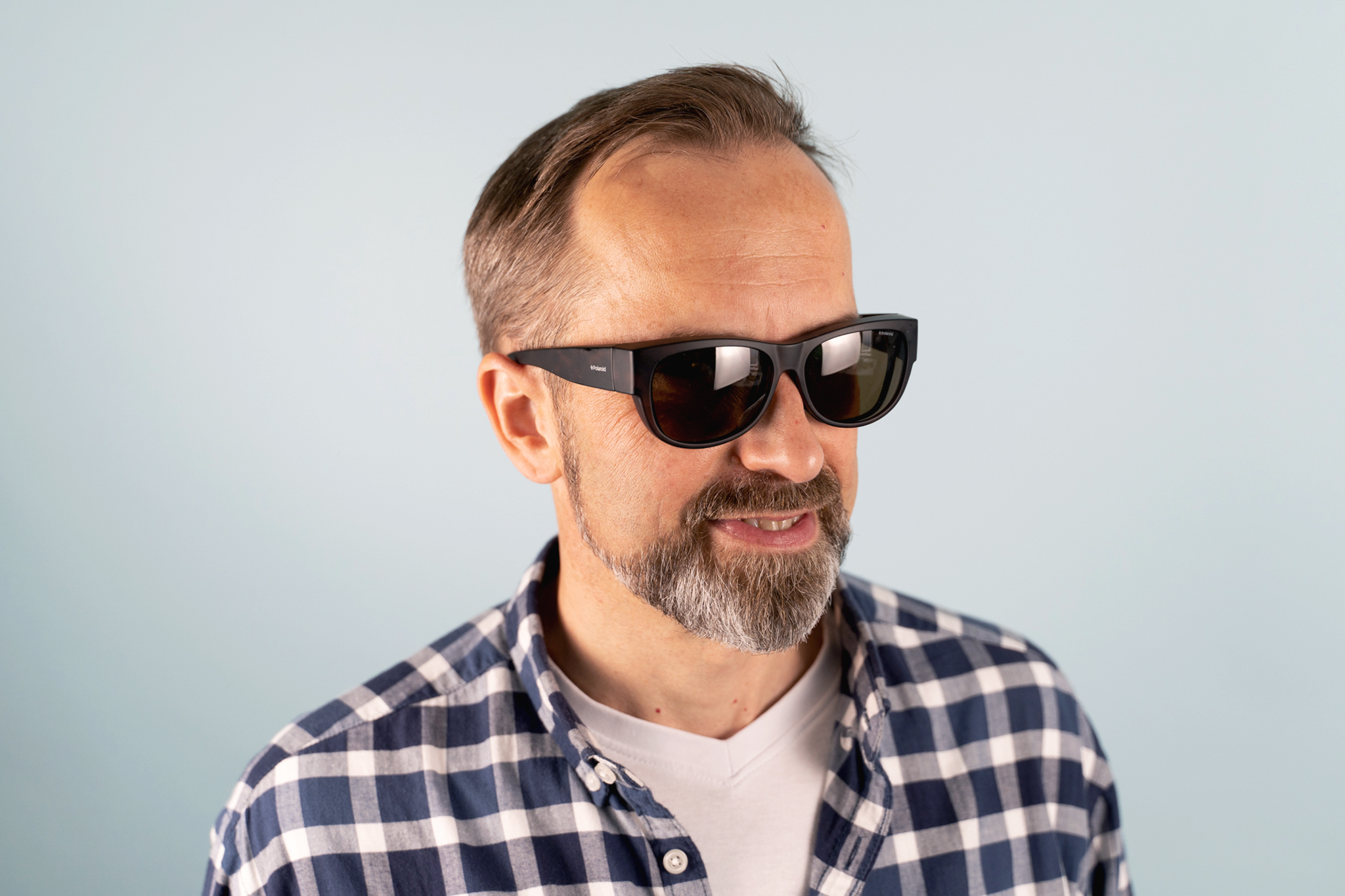 uzliekamās saulesbrilles